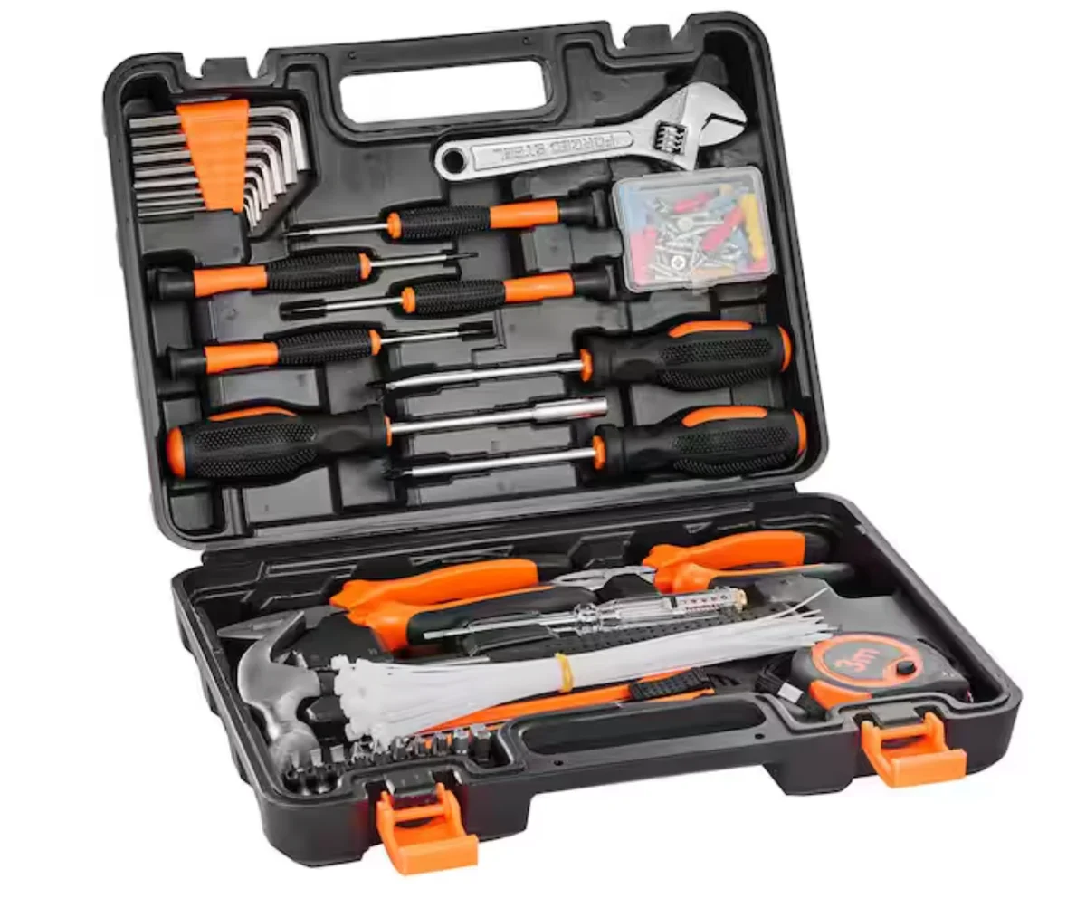 An open tool kit with black and orange tools.