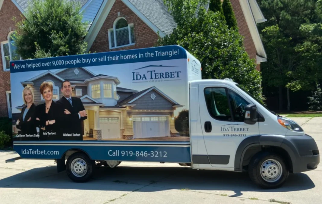 Branded real estate moving truck.